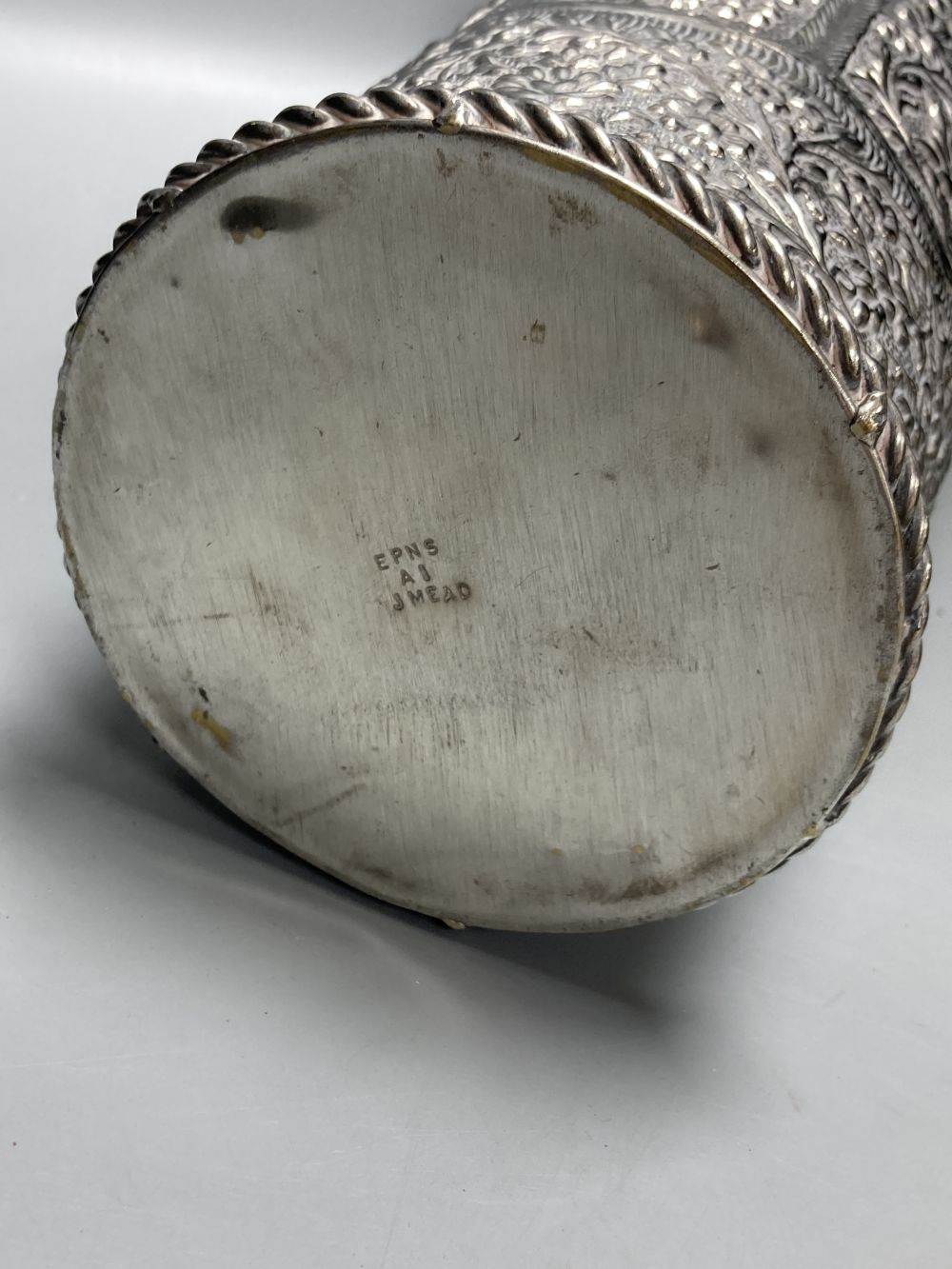 A pair of silver plated embossed champagne buckets, 48cm high including handle